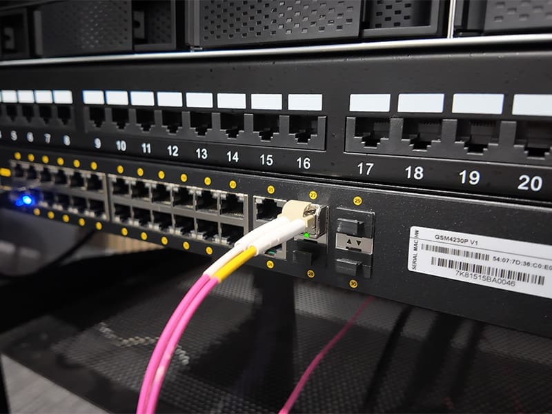 close up of a cable connected to a computer